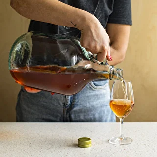 Lady demijohn 5 L with a screw cap, without a basket (white glass, golden screw cap) – photo 7