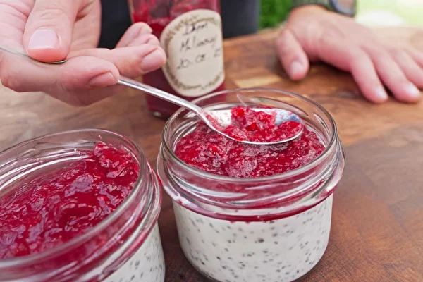 Coconut chia pudding with raspberry jam