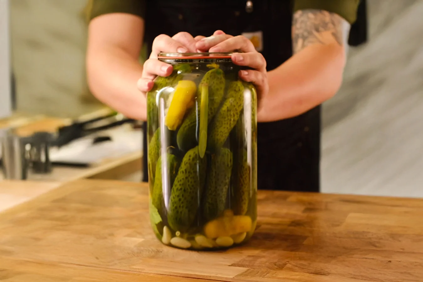 Half-sour cucumbers in honey-lemon brine