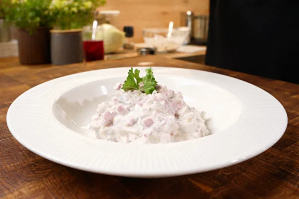 Herring with fermented plums and apple