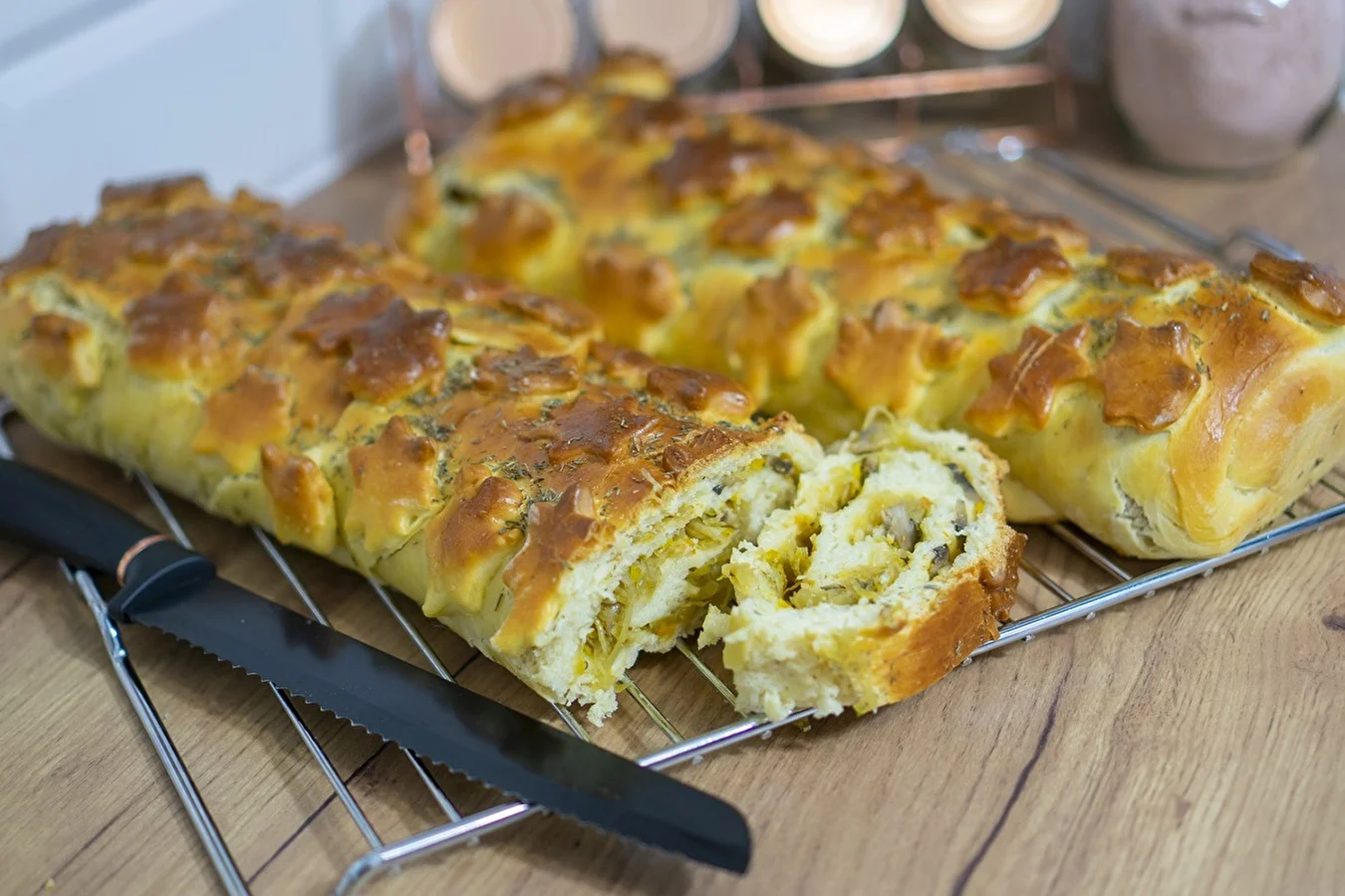 Yeast kulebiak with cabbage and button mushrooms