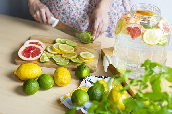 Homemade isotonic drink with lemons, limes and grapefruit