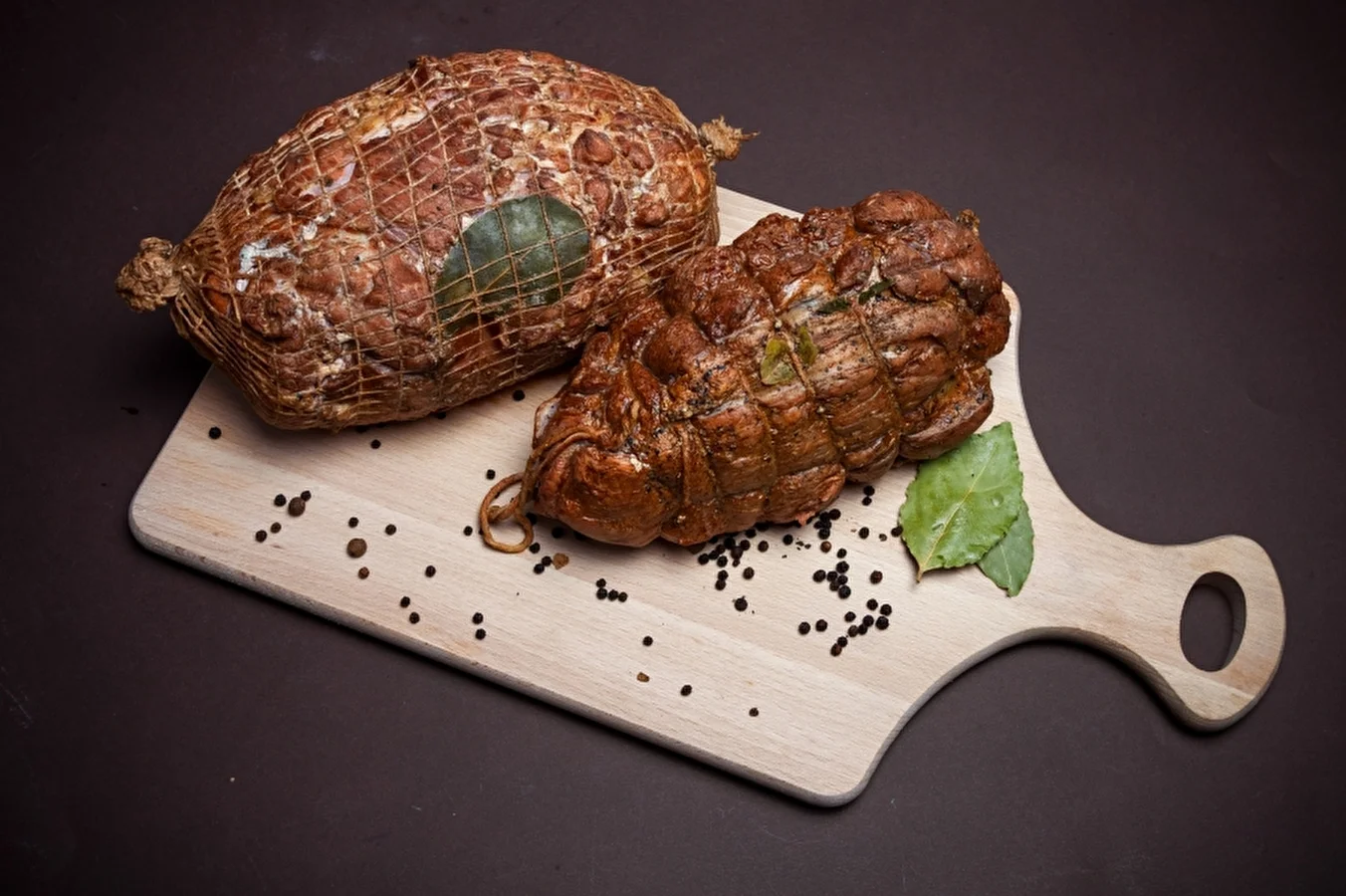 Homemade baked ham with herbs