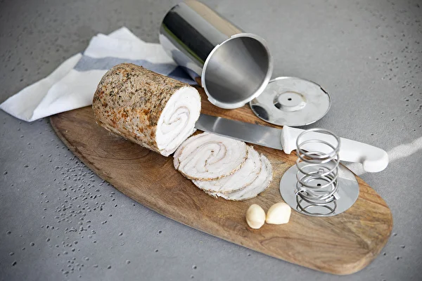 Pork loin from a ham cooker - rolled with fatback