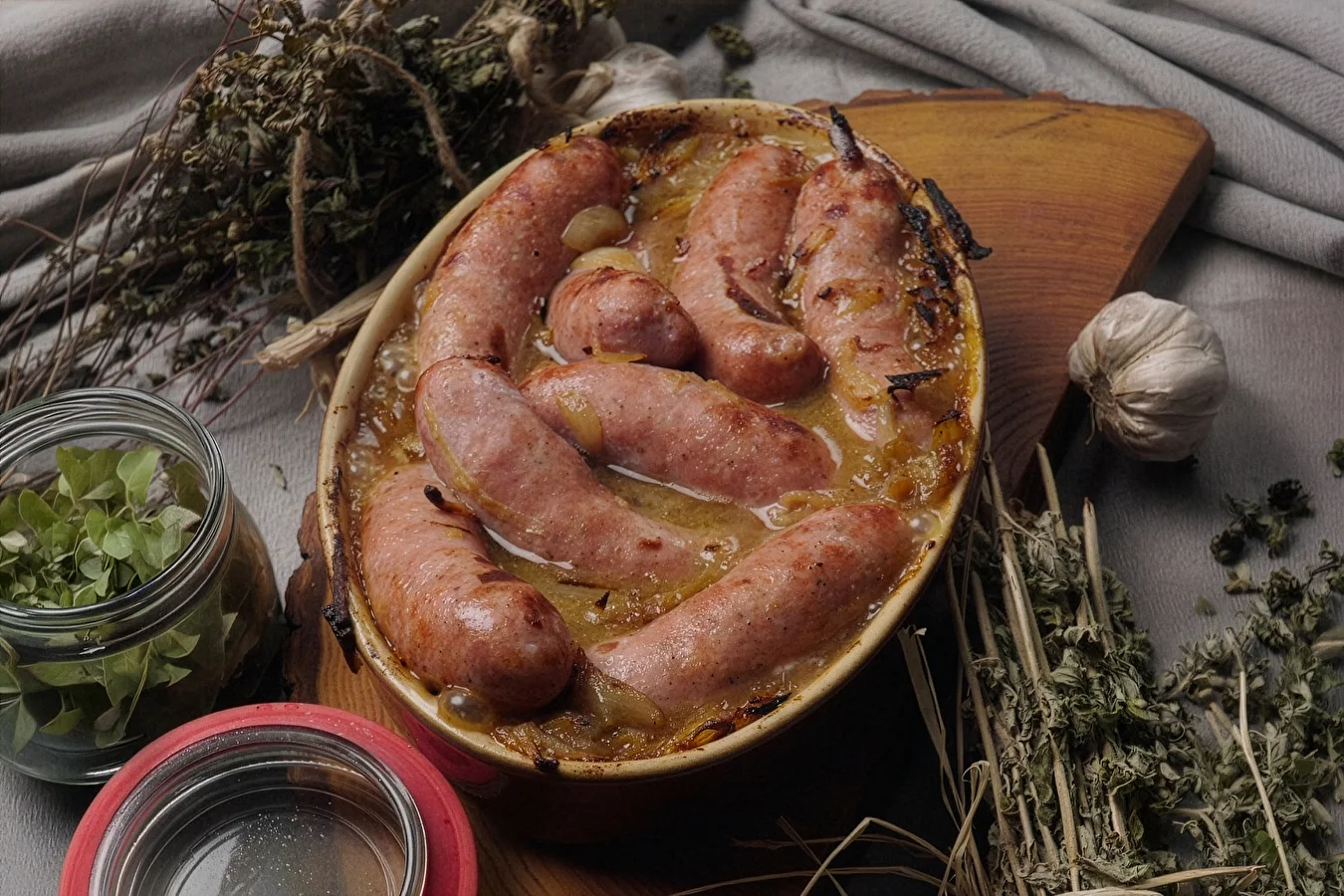 Polish white sausage baked in beer with mustard and onions