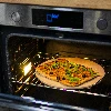 Pizza stone with stand and cutter, made of cordierite, round, 33 cm - 11 ['gift', ' homemade pizza', ' for baking pizza', ' for serving pizza', ' for baking bread', ' for baking buns']