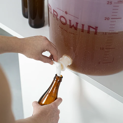 Container for fermenting beer featuring an airlock, a tap, a thermometer and a sediment reducer - 19 ['beer kit', ' beer fermentation', ' container with tap', ' airlock', ' sediment reducer', ' fermentation temperature', ' beer brewing thermometer', ' fermentation bucket', ' fermentation container', ' home-brewed beer']