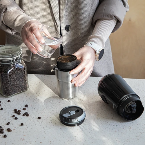 Electric burr grinder for coffee with brewer and thermal mug - 17 ['coffee grinder', ' electric grinder', ' coffee grinding', ' ground coffee', ' coffee grinding', ' grinder with brewer', ' grinder with dripper', ' grinder with thermal mug', ' grinder with brewer and mug', ' USB coffee grinder', ' modern coffee grinder', ' portable coffee grinder', ' mobile coffee grinder', ' battery-powered coffee grinder', ' disposable-battery-powered coffee grinder', ' USB-charged coffee grinder', ' ceramic burr grinder', ' burr grinder', ' handy grinder', ' gift idea']