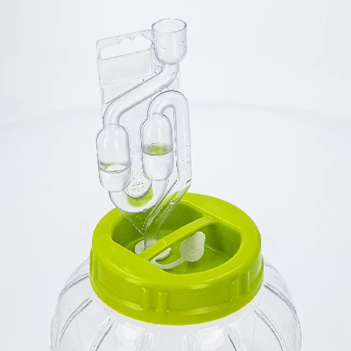 Plastic twist-off lid Ø100 with an opening and stopper - 7 ['plastic lid', ' jar lid', ' demijohn lid', ' lid with stopper', ' lid for fermenting', ' stopper for fermenting', ' tight lid', ' Ø100 lid', ' lid with a handle']