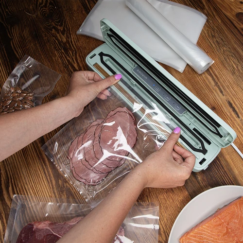 Vacuum sealer - versatile, pistachio colour - 13 ['vacuum packing', ' vacuum sealers', ' food storage', ' textured bags', ' bag sealing', ' vacuum packer', ' vacuum sealer', ' for food packing', ' vacuum packing set', ' vacuum sealer film', ' for meat', ' for fish', ' for cheese', ' how to extend the shelf life of food', ' food storage at home', ' gift', ' kitchen equipment', ' practical kitchen accessories', ' efficient vacuum sealer', ' sage colour', ' pistachio colour']